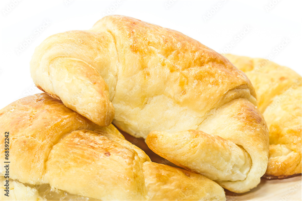 Fresh croissant isolated on white
