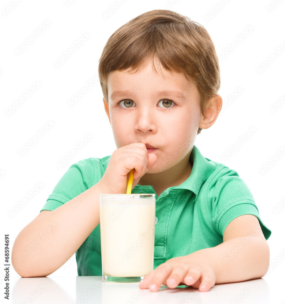 Cute little boy with a glass of milk Cute little boy with a glass of milk