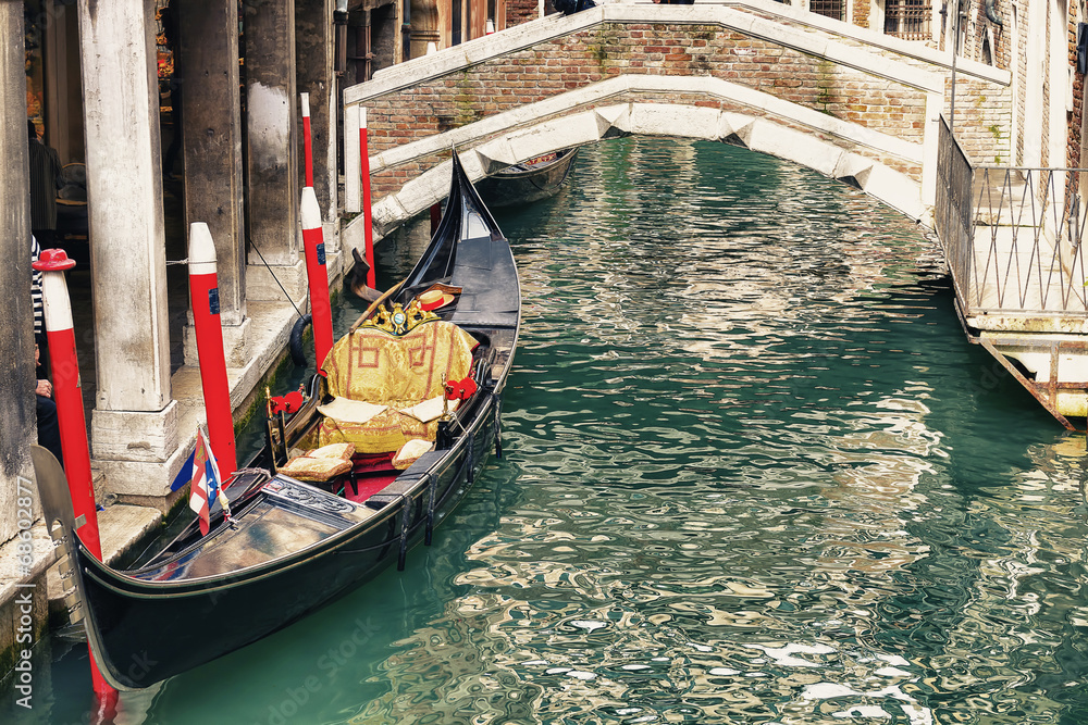 Gondola in a little canal in Venice