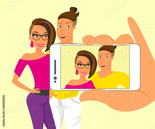 Smiling couple taking a snapshot of themselves
