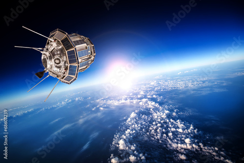 Space satellite over the planet earth