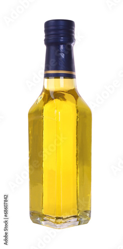 Yellow glass liquor bottle on white background.