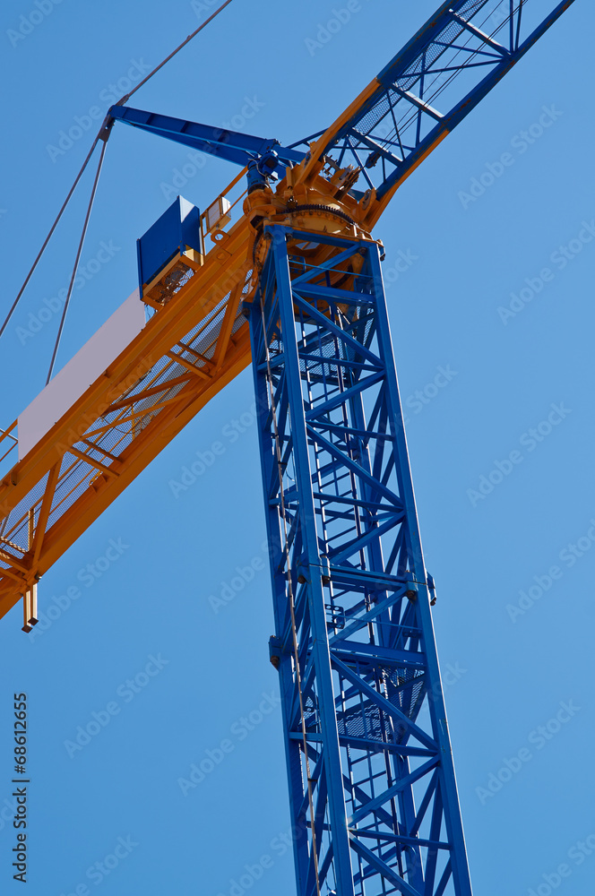 New blue elevating crane with suspension.