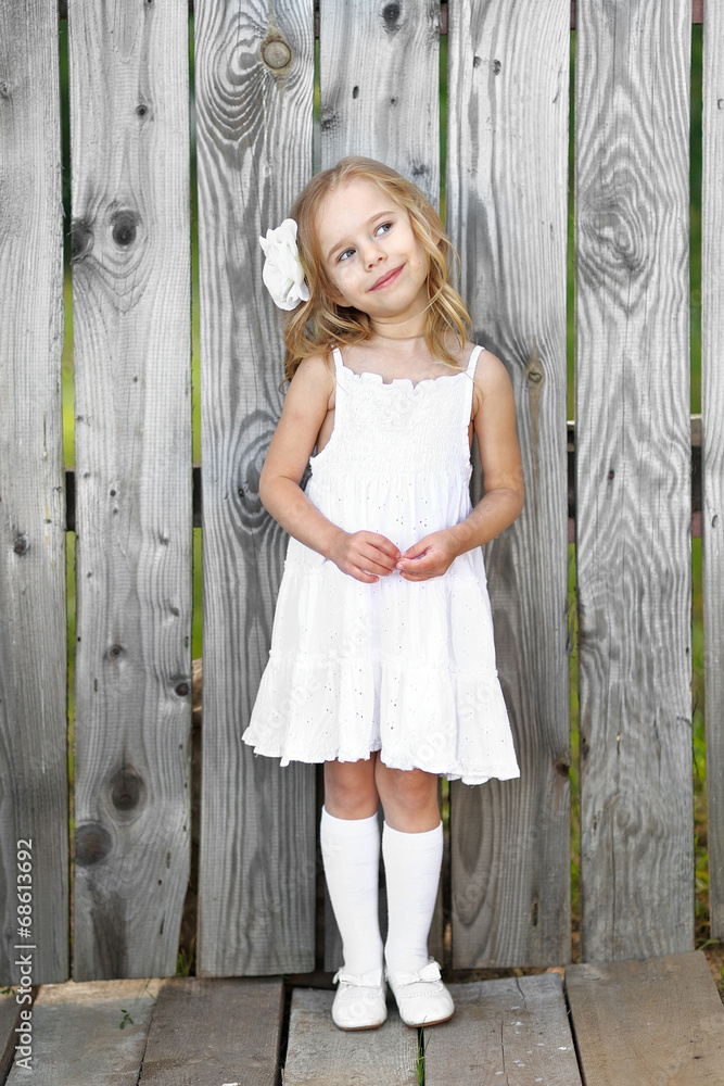 Naklejka premium portrait of a beautiful fashion little girl