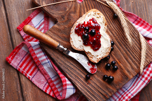 Fresh toast with homemade butter and blackcurrant jam