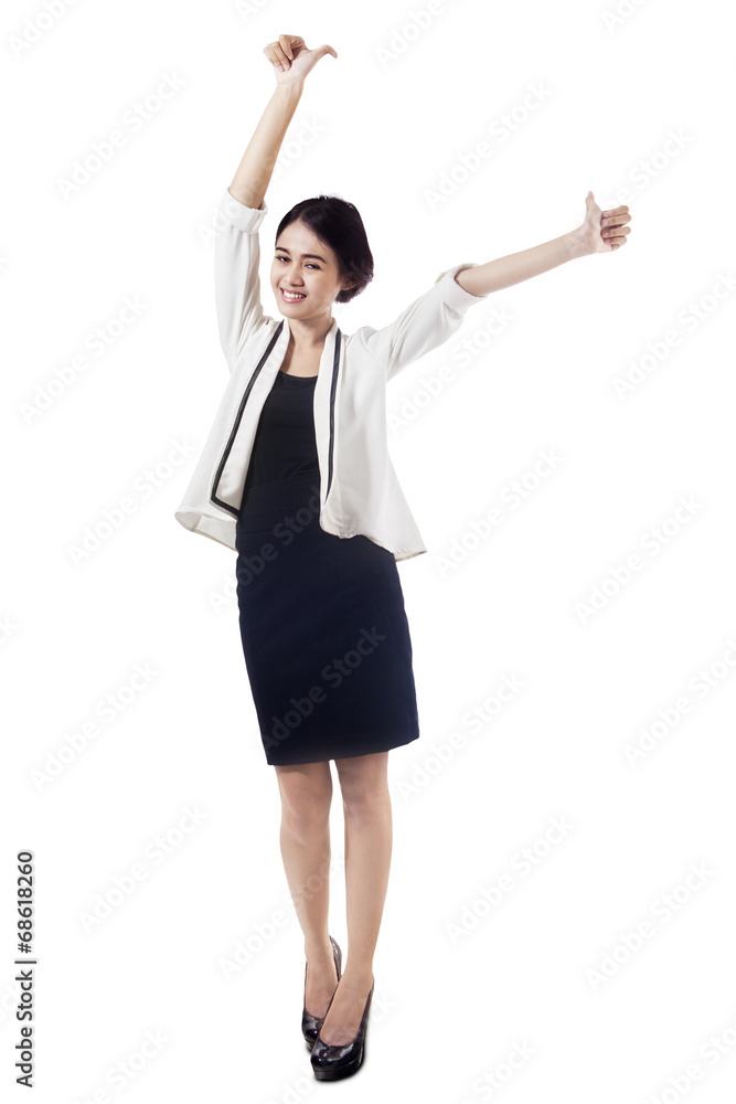 Portrait of full length businesswoman show thumbs-up Portrait of full length businesswoman show thumbs-up