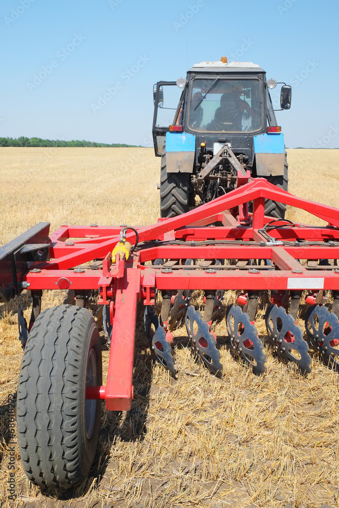 Fototapeta premium tractor with a plow