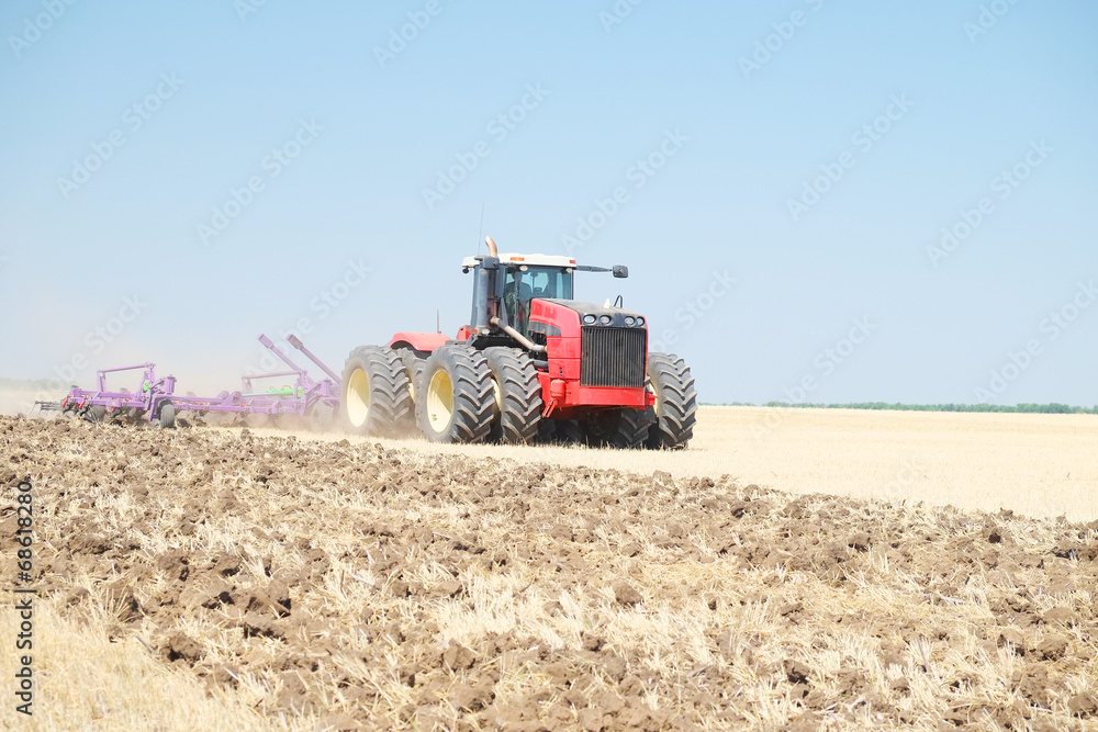 tractor with a plow tractor with a plow