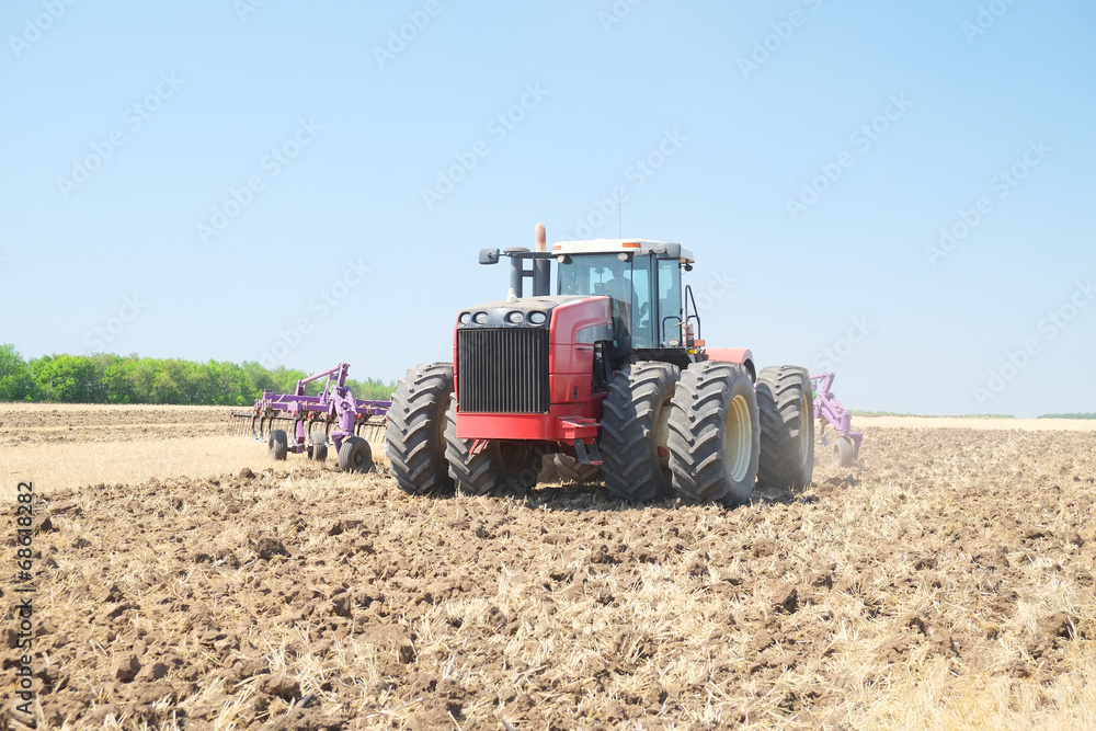 Obraz premium tractor with a plow