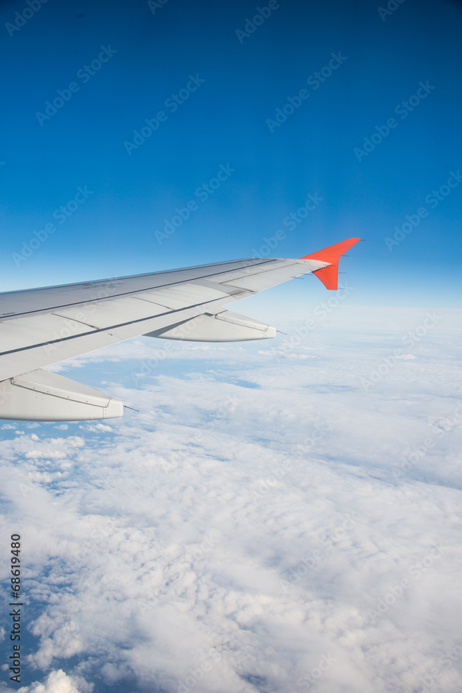 Airplane wing out of window Airplane wing out of window