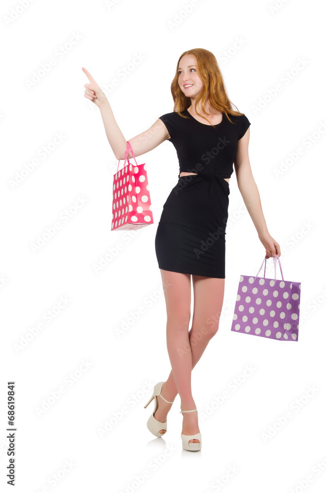 Woman with shopping bags isolated on white Woman with shopping bags isolated on white