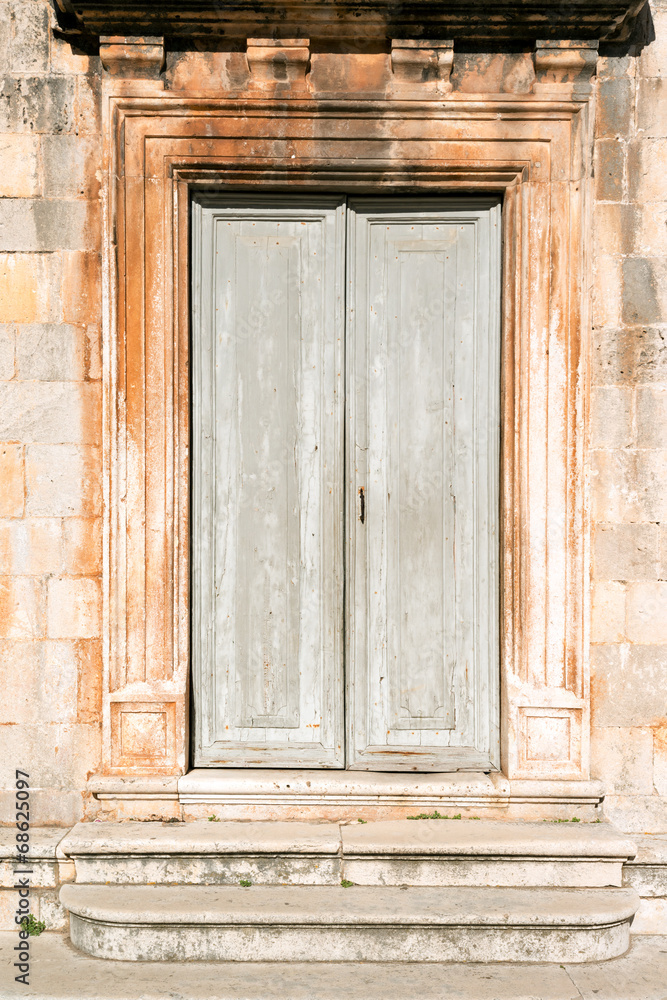Beautiful ancient door in historic Stari Grad, Croatia Beautiful ancient door in historic Stari Grad, Croatia
