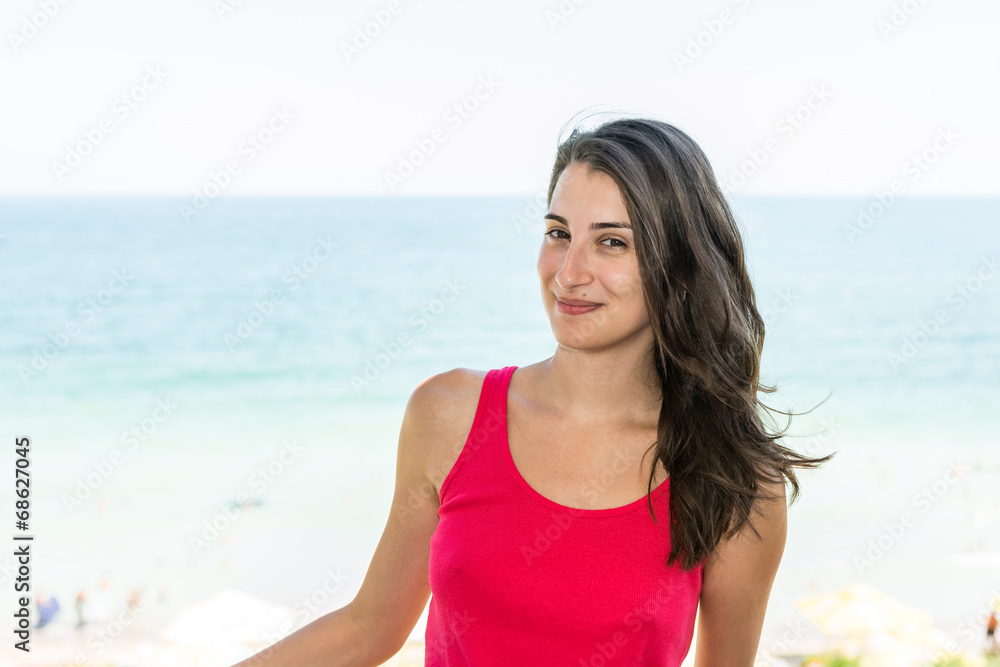 Beautiful Happy Girl Portrait With Sea Background