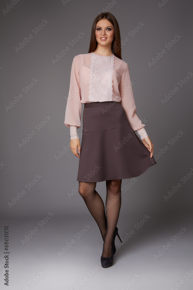 Beautiful sexy girl business clothes skirt blouse high heels Beautiful sexy girl business clothes skirt blouse high heels