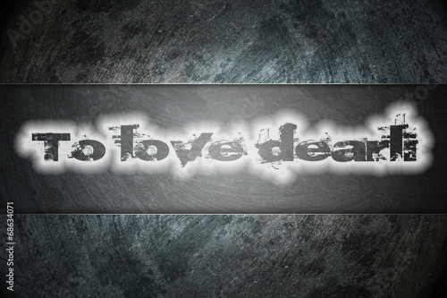 To love dearly text on background