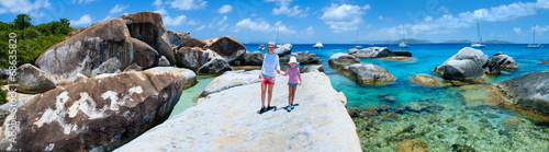 Mother and daughter at scenic coast photo