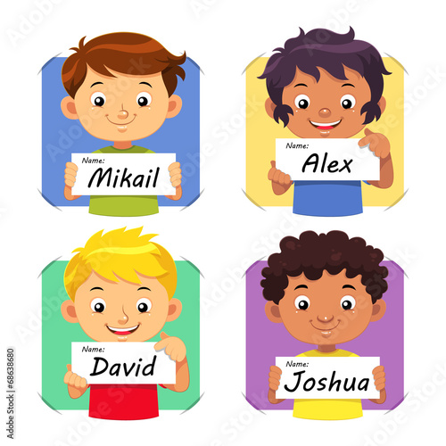 Boys holding their name tag.