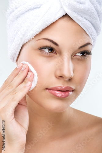 Beautiful woman with flawless skin, cleansing