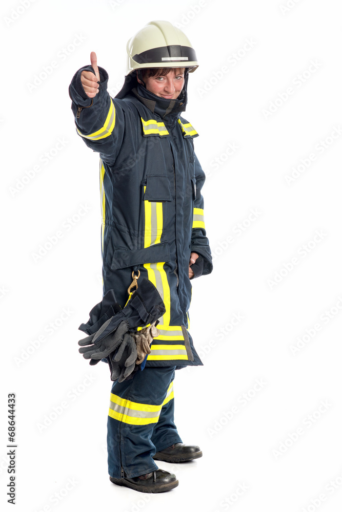 Feuerwehrfrau zeigt Daumen hoch Feuerwehrfrau zeigt Daumen hoch
