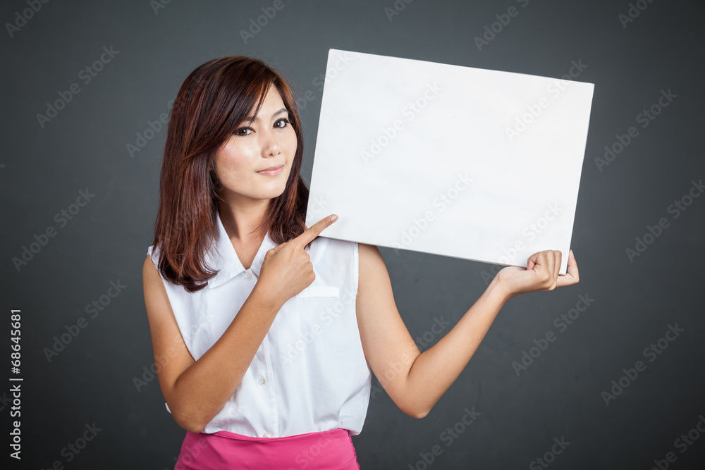 Asian girl point to blank sign Asian girl point to blank sign
