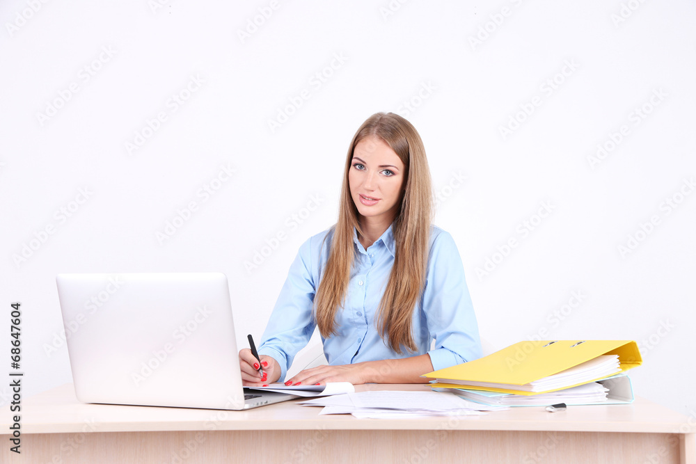 Business woman with documents at her workplace Business woman with documents at her workplace