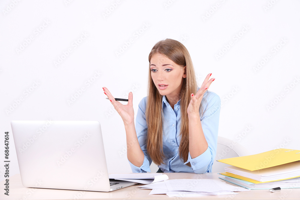 Business woman with documents at her workplace Business woman with documents at her workplace