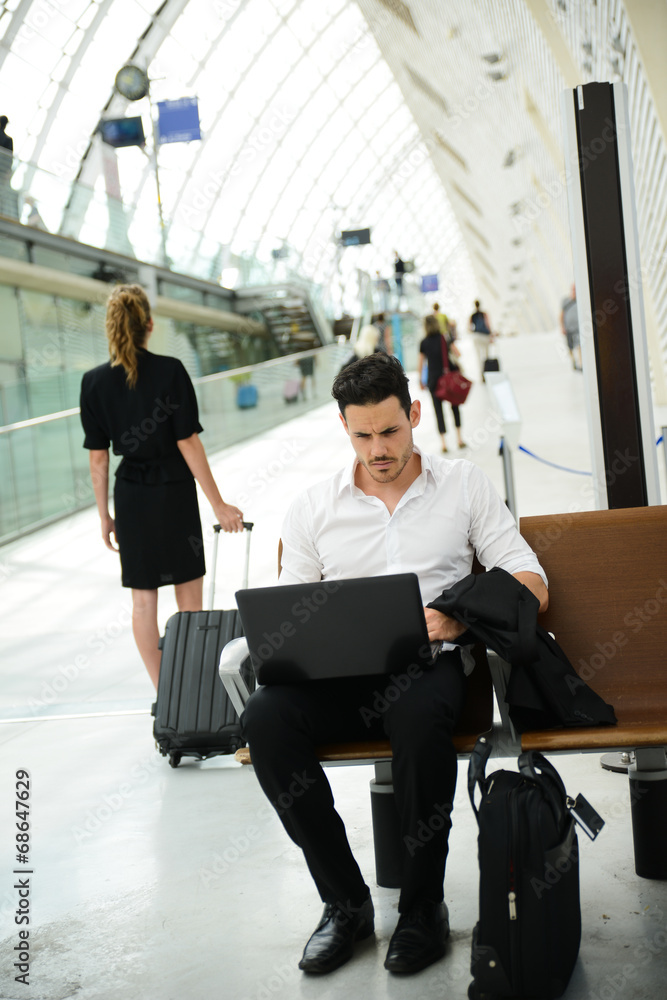 handsome businessman public station working computer wifi area handsome businessman public station working computer wifi area