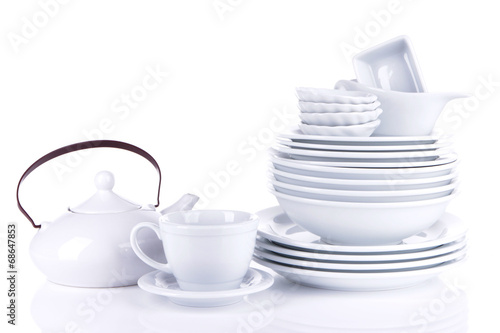 White crockery and kitchen utensils, isolated on white