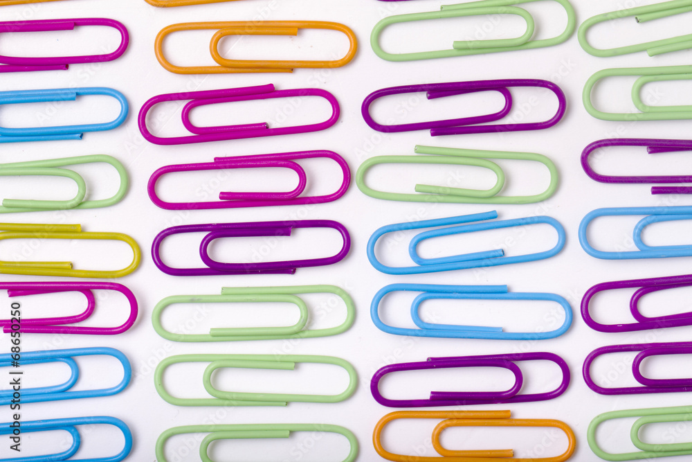 vertical lines of colorful office paper clips vertical lines of colorful office paper clips