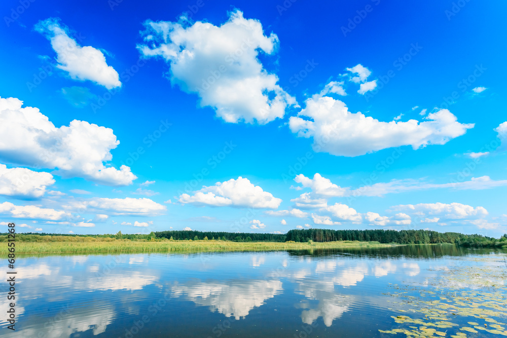 Clouds Reflection On Lake.
