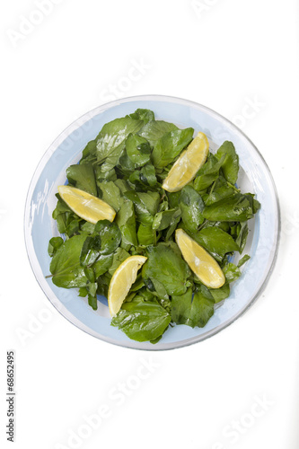  fresh and healthy watercress salad with lemon.