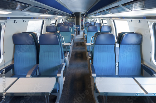 Interior of an empty train cabin © leeyiutung