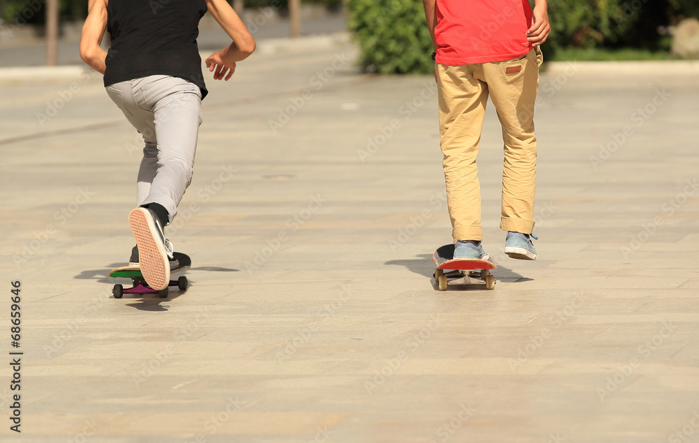 young boy skateboarding in the city 