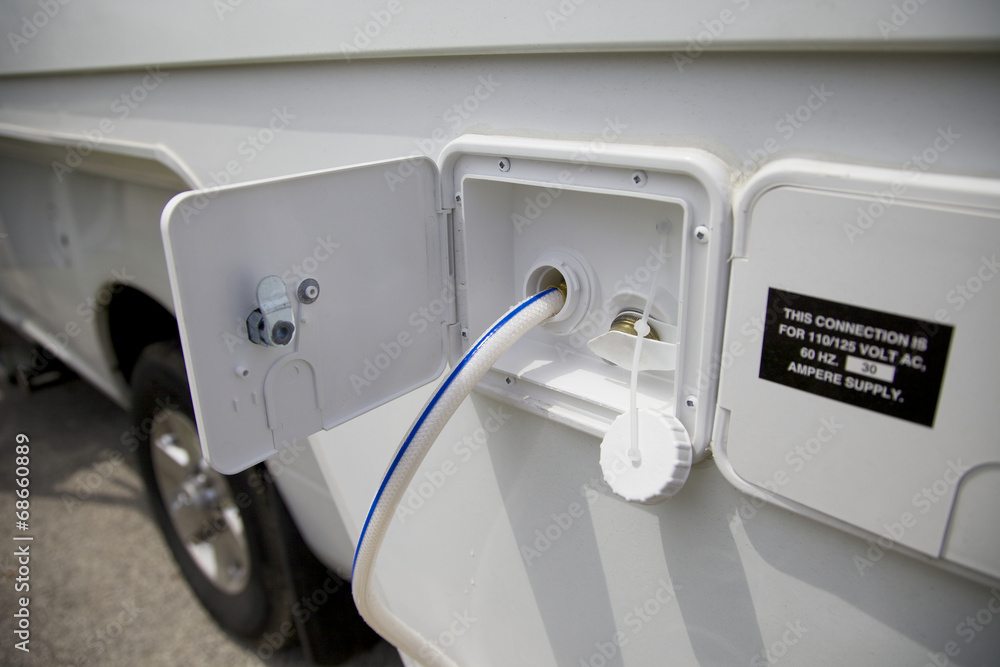 Wassertank und Ventil an einem Wohnmobil Stock Photo