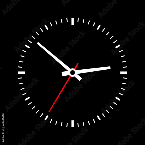 Clock dial on a black background.