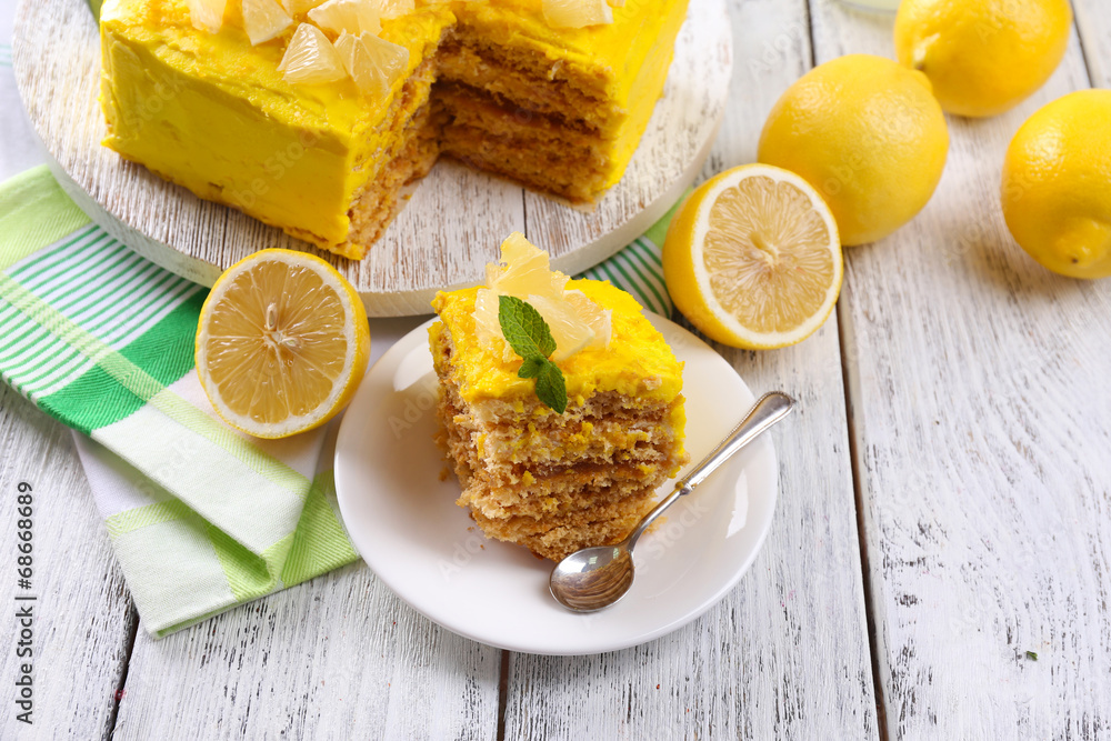Tasty lemon dessert on wooden table Tasty lemon dessert on wooden table