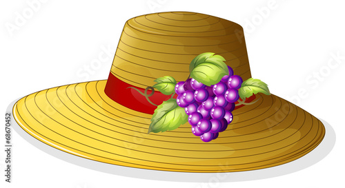 A fashionable hat with a fruit