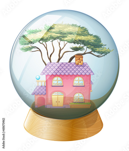 A crystal ball with a beautiful house inside