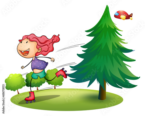 A girl rollerskating near the pine tree