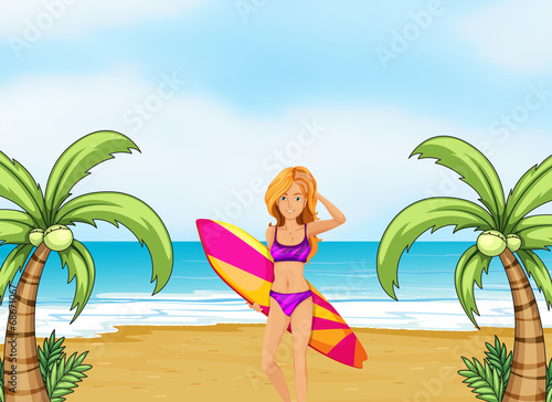 A female surfer at the beach