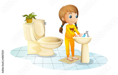 A young lady washing her hands