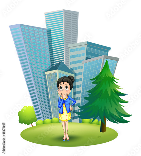A woman in front of the building