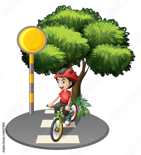 A street with a boy biking