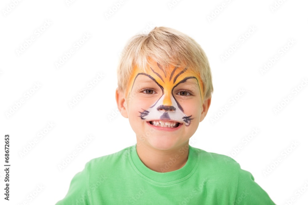 Happy little boy in tiger face paint Happy little boy in tiger face paint