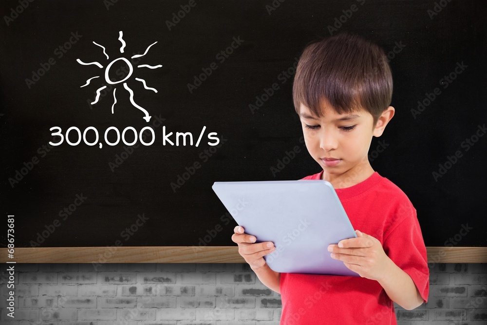 Composite image of cute boy using tablet Composite image of cute boy using tablet