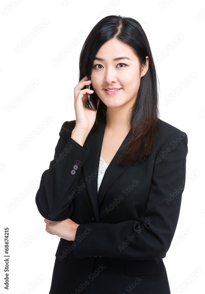Asian businesswoman talk to cellphone Asian businesswoman talk to cellphone