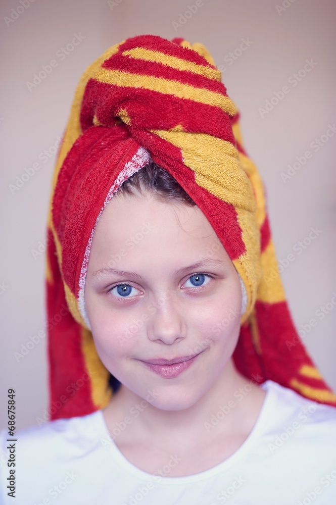 Beautiful happy teen girl with towel on her head Beautiful happy teen girl with towel on her head