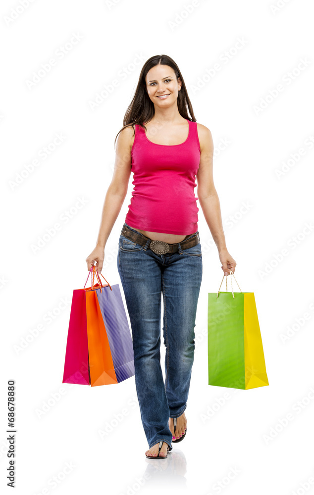Pregnant woman shopping isolated on white