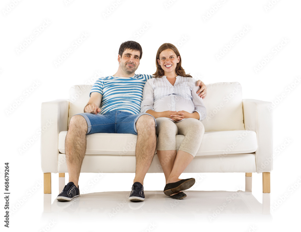 Pregnant couple in studio
