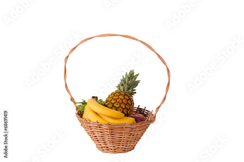 Composition with assorted fruits in basket